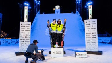 Mathilde Gremaud (l) and Matěj Švancer (r) celebrate on the podium at the Big Air Chur in Chur, Switzerland, on 18 October 2024. Credit: Ondrej Kolacek / Red Bull Content Pool