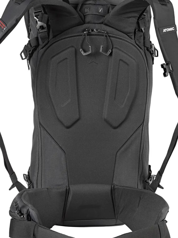 Waterproof black ski backpack with ergonomic design and multiple compartments for winter sports gear. Perfect for skiing, snowboarding, or winter hiking adventures. Lightweight and durable for winter outdoor activities.