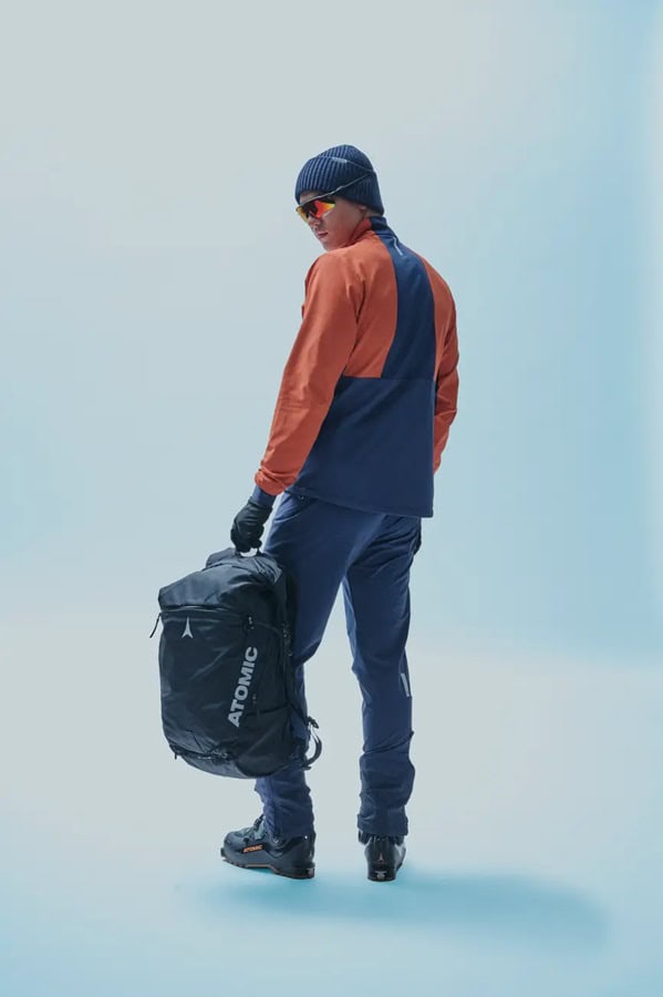 Warm winter outdoor jacket and gear for skiing or snowboarding, showcasing winter apparel for cold weather sports.