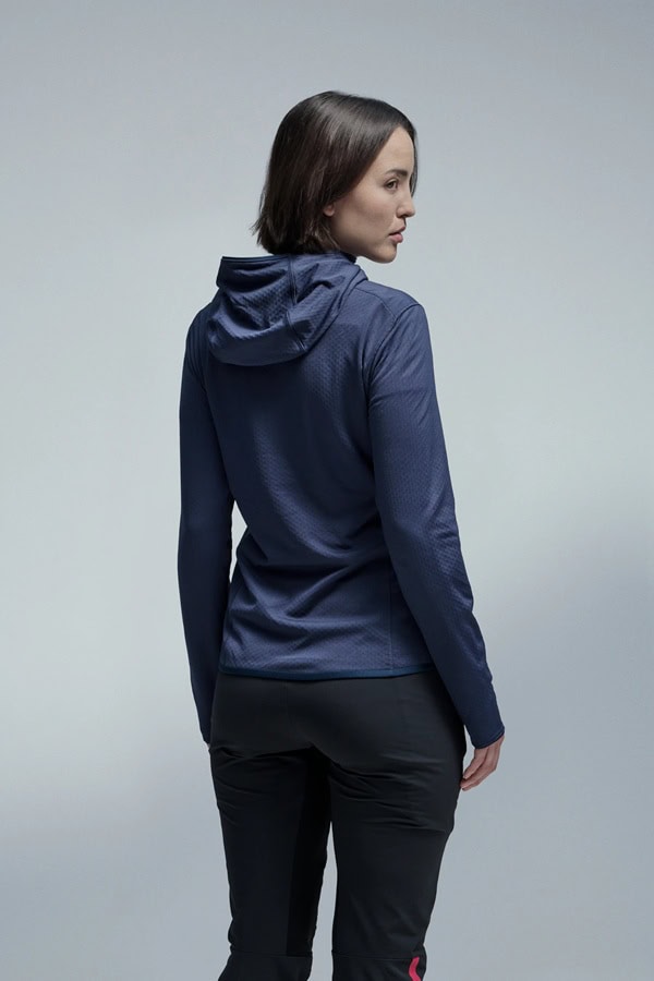 Lightweight navy blue winter jacket with hood, perfect for outdoor cold weather activities. Stylish and functional, ideal for winter sports and everyday winter wear.