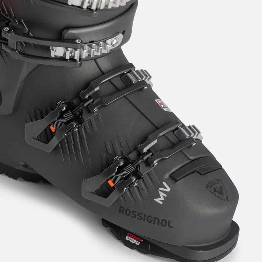 Rossignol ski boot with multiple buckles and strap closures, designed for winter sports enthusiasts seeking performance and comfort on the slopes.