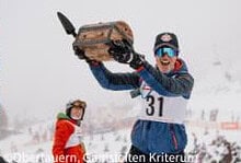 Skiers and snowboarders enjoying a snowy mountain slope in a winter ski resort, showcasing popular winter sports activities and snowy landscape scenery.