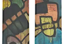 Vibrant graffiti art on pair of skis, featuring colourful abstract faces and eye designs, perfect for winter sports enthusiasts seeking stylish winter equipment.