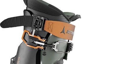 Precision digital ski boot with advanced binding system, ideal for winter sports enthusiasts seeking reliable performance on snow-covered terrains.