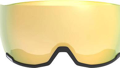 High-quality ski goggles with reflective yellow lenses, designed for optimal visibility and protection during winter sports in snowy conditions.