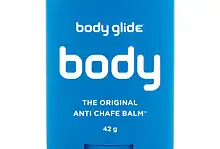 Silicone anti-chafe balm in blue container, body glide brand, designed for smooth skin protection during winter activities or sports. Compact, portable, perfect for winter skin care.