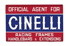 Vintage-style sign indicating official agent for Cinelli racing frames, handlebars, and extensions.