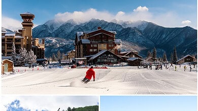 Snowy ski resort with mountains, skiers, and a helicopter flying over a forested area.