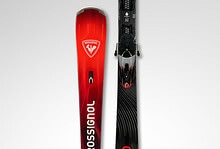 Pair of Rossignol Hero MT-Ti skis designed for advanced winter skiing, featuring a sleek black and red design with high-performance features for optimal snow traction.