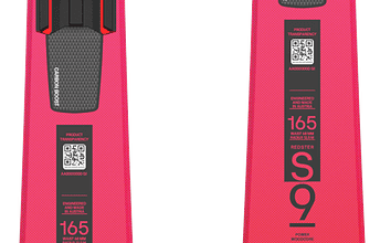 Pair of Atomic Redster S9 FIS skis designed for professional alpine racing, featuring a sleek red and black design with advanced technology for high performance on snow.