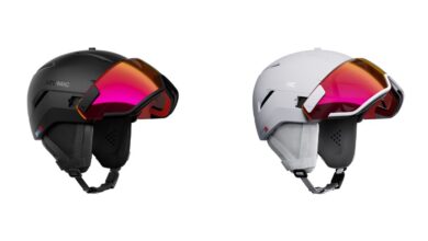 Black and white Atomic Savor GT AMID ski helmets with integrated visors