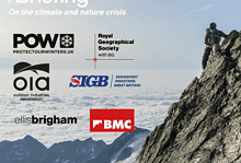 Climber on a snowy mountain cliff representing winter safety and emergency briefing for climate and nature crisis.