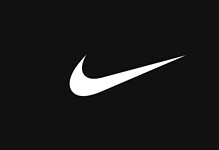 Close-up of the Nike swoosh logo in white on a black background, representing sportswear and athletic apparel.