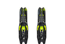 Pair of black and neon yellow ski bindings designed for winter skiing and snowboarding, featuring adjustable straps and durable construction.